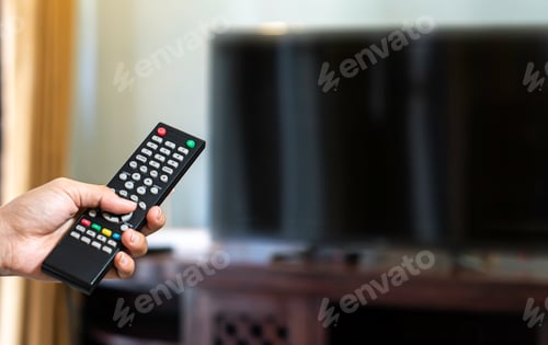 Preview: holding television remote free space for text