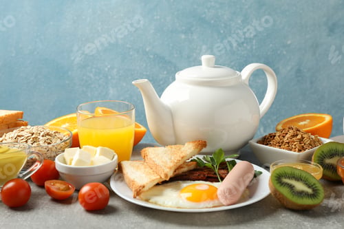 Preview: Delicious breakfast or lunch background. Grey table