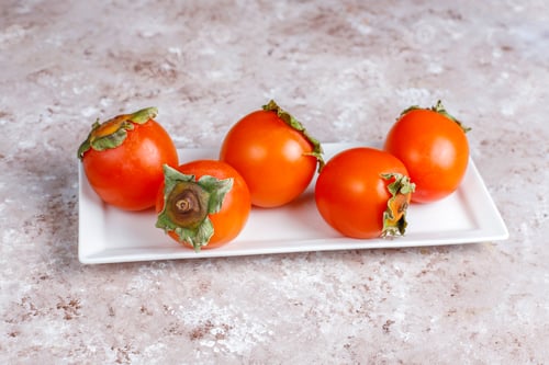 Preview: Fresh organic ripe persimmon fruits.