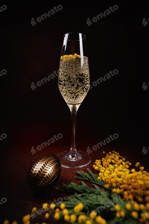 Preview: Festive Easter table setting with champagne and flowers