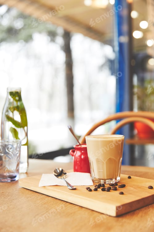 Preview: Restaurant table with coffee served in glass