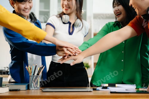 Preview: Close up on hands of business people join together their hands together