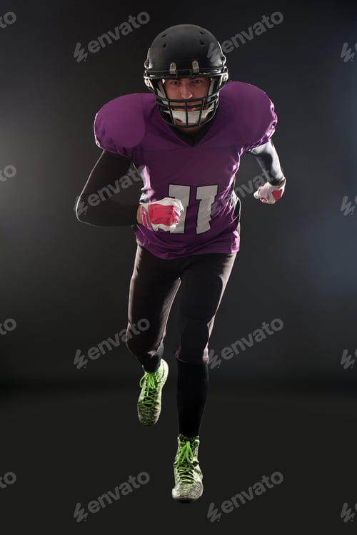 Preview: American football player wearing uniform on dark background
