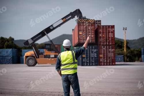Preview: Engineer worker under working with fork lift container truck is transportation container shipping do