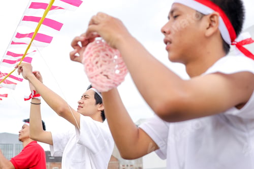 Preview: Young Indonesian Men Collaborate To Set Up Decorations