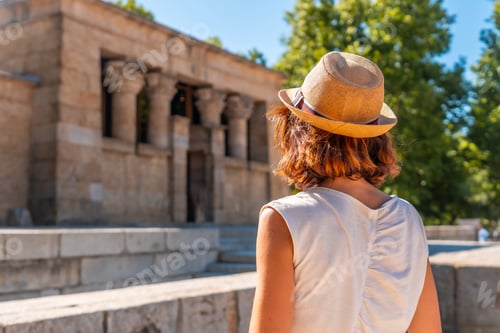 Preview: Temple of Debod in the city of Madrid of Egypt, young tourist woman with hat in the ancient Egyptian