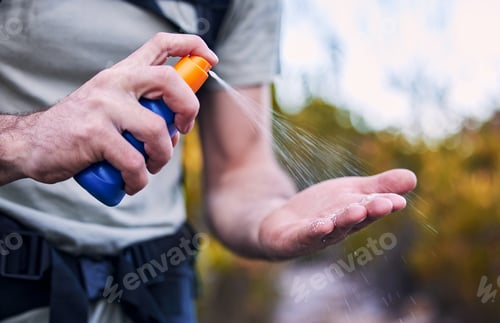 Preview: Sunscreen spray, hand and closeup while hiking for security from the sun and health in summer. Exer
