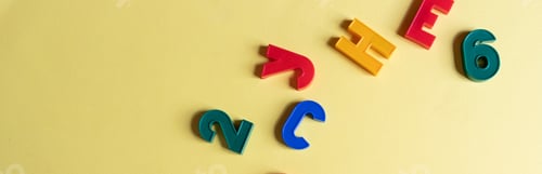 Preview: Multi-colored English letters and numbers on yellow background. Kid's set for teaching reading and