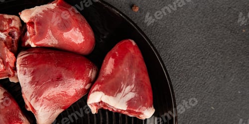 Preview: Turkey heart offal meat tasty snack fresh delicious gourmet food background on the table