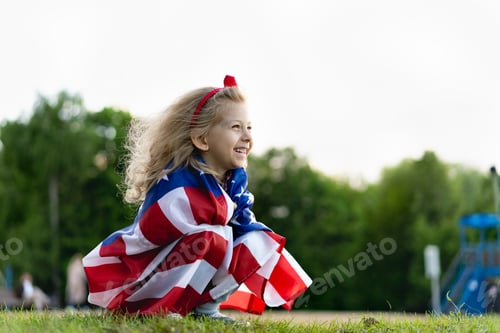Preview: Little blonde girl, happy child on the shore with the American flag, patriotism