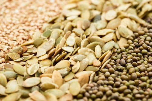 Preview: Close up View of Raw Pumpkin Seeds Near Maash And Green Buckwheat