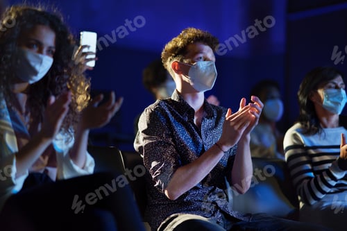 Preview: Group of people clapping while listening to presentation at conference, coronavirus concept