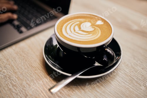Preview: .Closeup of cup of cappuccino.