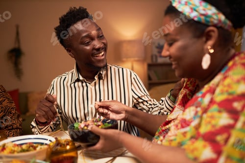 Preview: Man Talking to Wife at Dinner