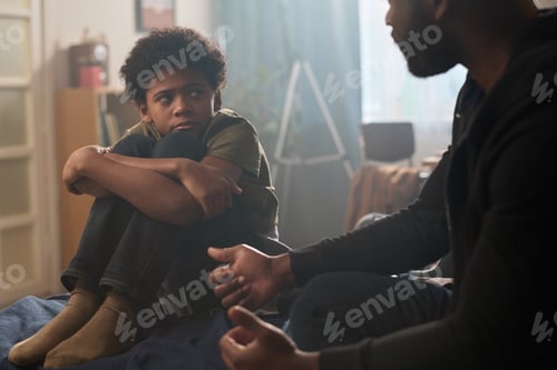 Preview: Troubled Boy Talking to Parent