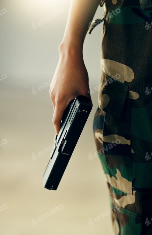 Preview: Hand, gun and a soldier closeup on the battlefield during war or combat training for the military.