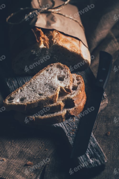 Preview: Rustic bread loaf on dark background