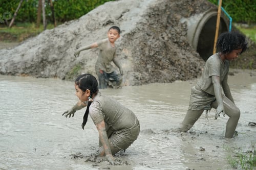 Preview: Group of happy children playing at playground