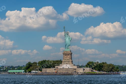 Preview: Landscape panorama of The Statue Of Liberty with white clouds and blue sky