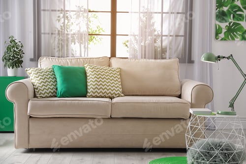 Preview: Comfortable couch near window in modern living room interior