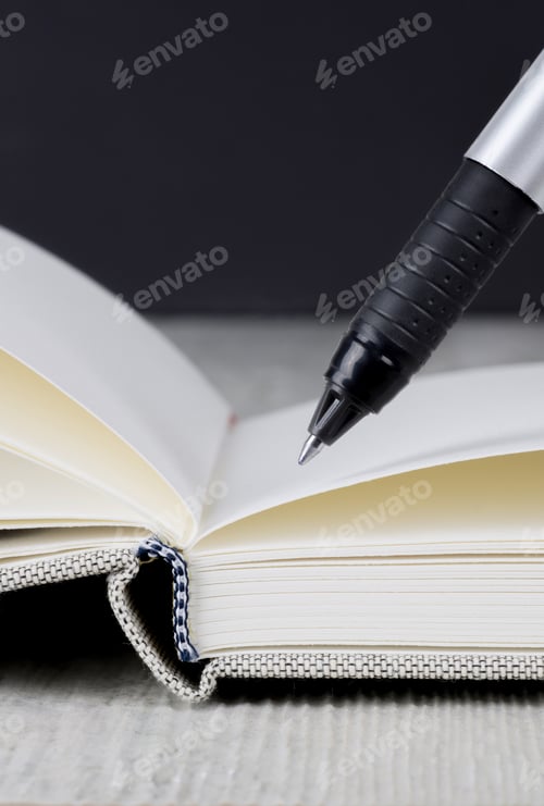 Preview: Open Book and Pen