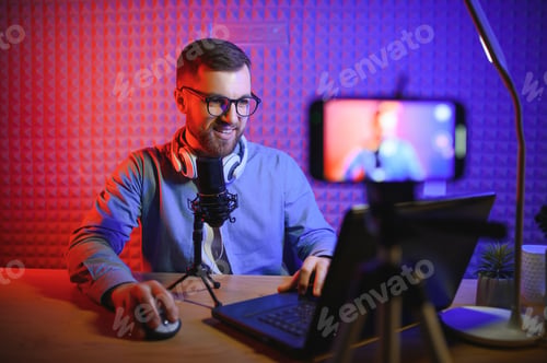 Preview: A video blogger records content in his studio.