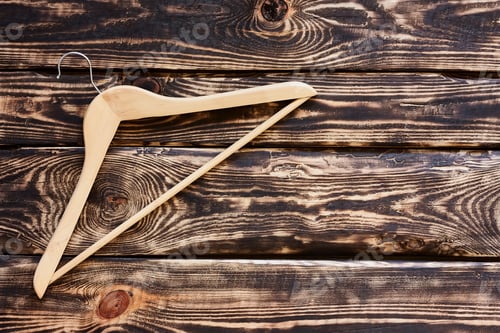 Preview: Wooden Hanger on Rustic Wood Background