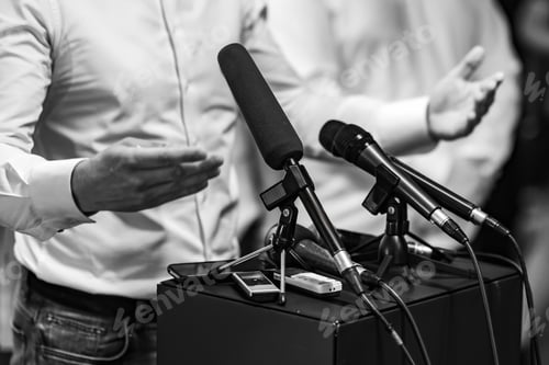 Preview: Businessman during press conference