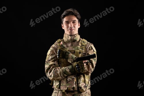 Preview: front view of military serviceman in uniform holding gun on black background force soldier navy