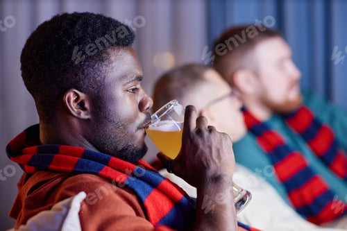 Preview: Black Man as Sports Fan Drinking Beer