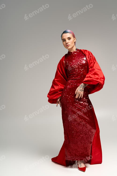 Preview: Festive winter celebration with a beautiful woman in a sparkling red gown