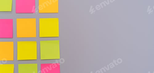 Preview: Horizontal photo of table made of multicolored stickers on lilac wall