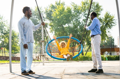 Preview: Beautiful happy african american family bonding at the park