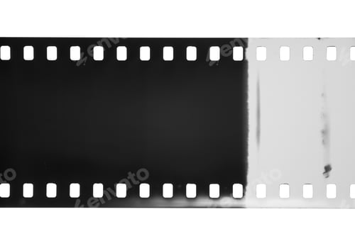 Preview: Length of film leader with light leaks isolated on a white.