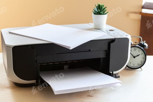 Preview: Close up of an office table with printer on it