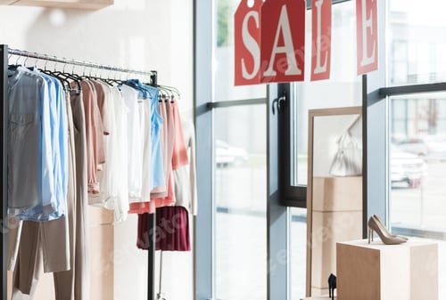 Preview: Sale in womens and mens clothes shop