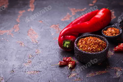Preview: Red chili pepper on old rusty background
