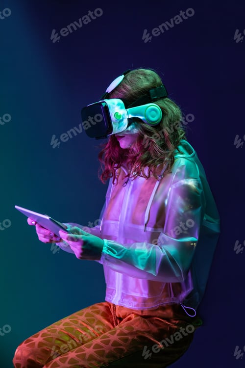 Preview: Woman in VR headset with tablet