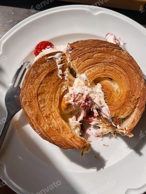 Preview: Raspberry Cream Filled Croissant Roll on a White Plate