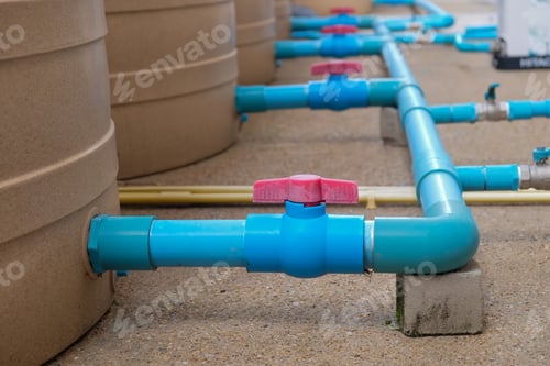 Preview: Blue water pipe installation from pump to tank.