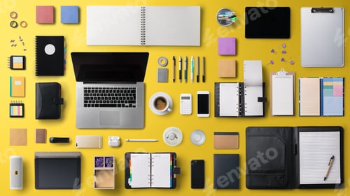 Preview: Flat lay top view office desk working space with laptop on yellow background