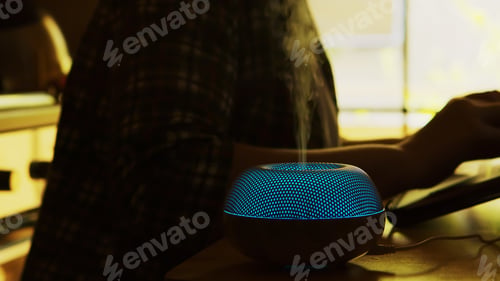 Preview: Silhouette of vapor with essential oils from diffuser