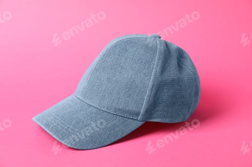 Preview: Denim baseball hat on pink background, closeup