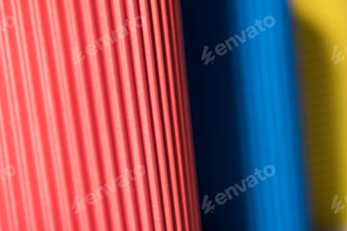Preview: selective focus of colorful paper cups, full frame