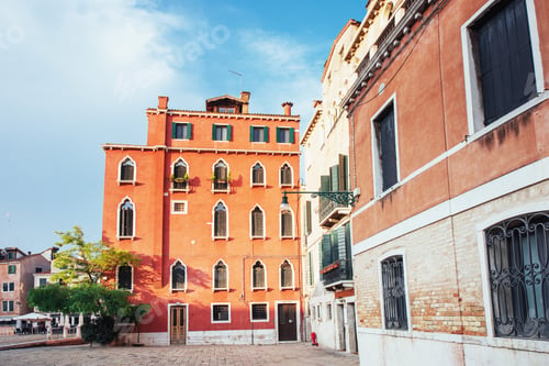 Preview: View of typical Venetian canal and colourful buildings in Venice, Italy