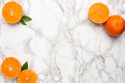 Preview: Fresh orange mangerine on marble background with copyspace , fruit flatlay, summer
