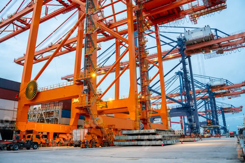 Preview: Crane loading cargo container freight container ship in the international terminal logistics