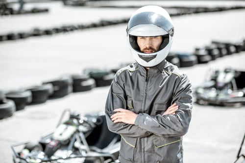 Preview: Racer in sportswear on the kart track
