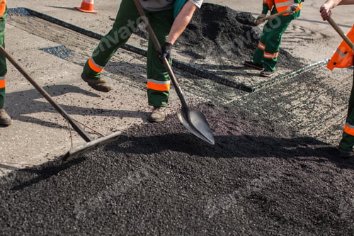Preview: Builder during Asphalting road works level raw material before the operation of the machine