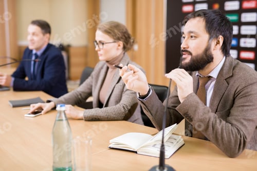 Preview: Asian Businessman at Press Conference
